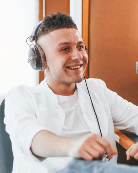 talks-and-uses-mic-young-man-is-indoors-in-the-rad-GUSDWHV.jpg talks-and-uses-mic-young-man-is-indoors-in-the-rad-GUSDWHV.jpg